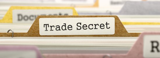 Folder with the label of Trade Secrets in a file cabinet