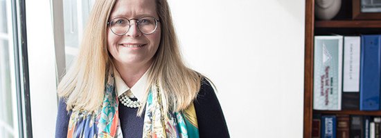 Attorney smiling in office