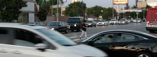 Cars passing each other in an intersection