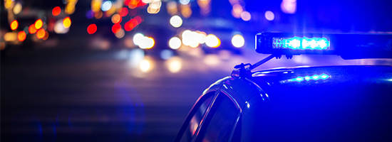 night police car lights in city